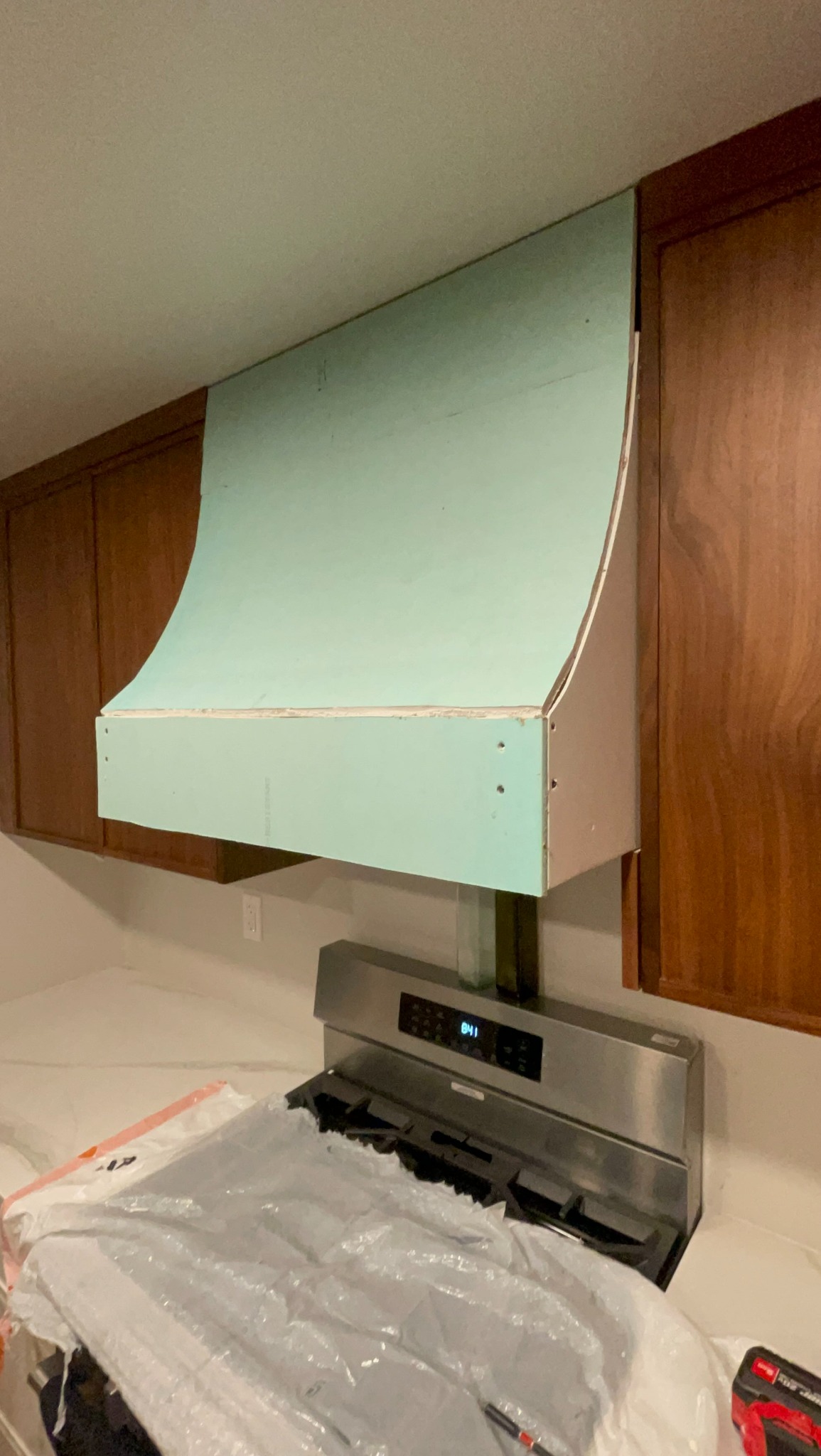 Range hood covered in drywall